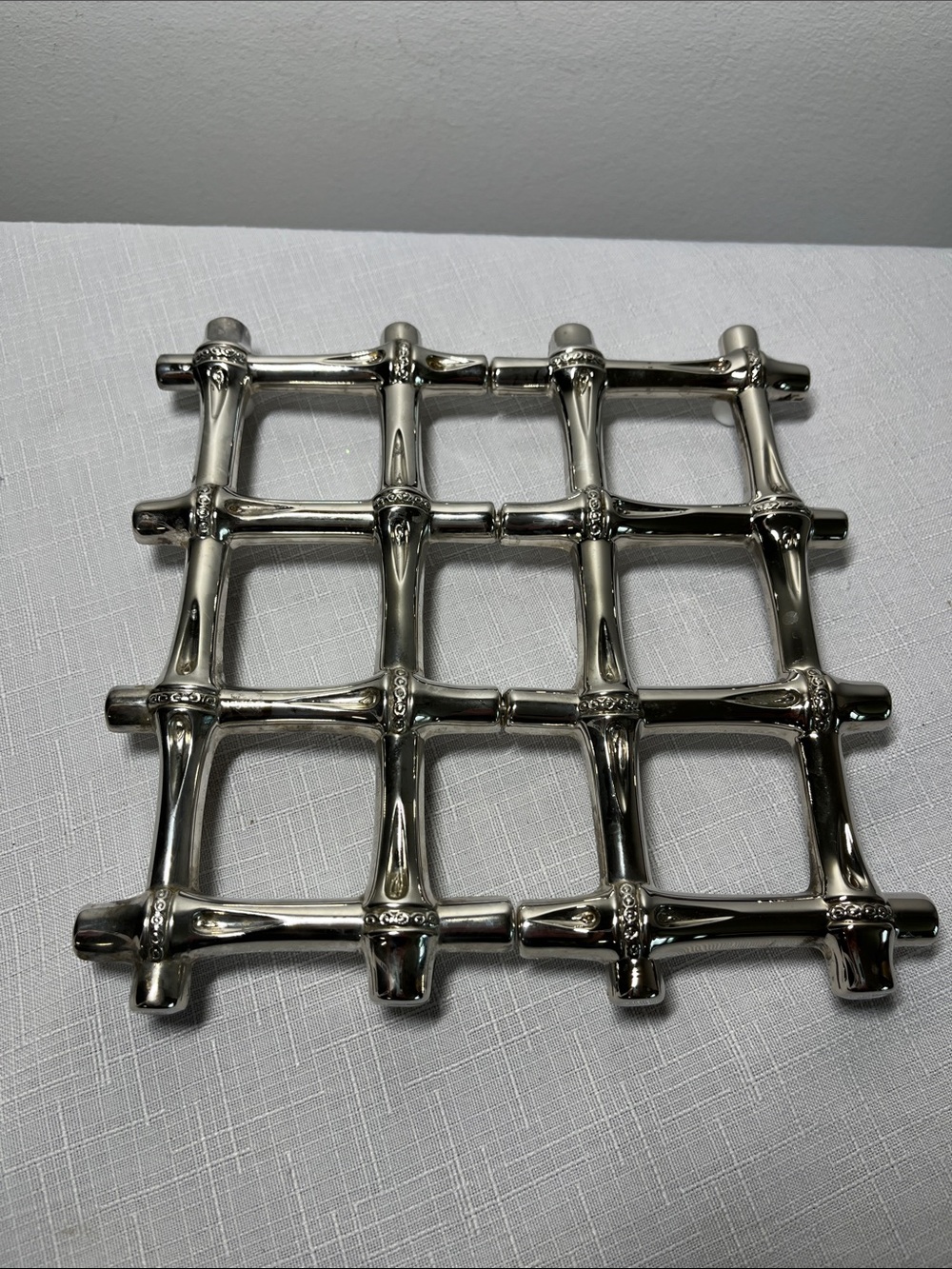 vintage FB Rogers silver-plated expandable bamboo trivet 
made in Italy